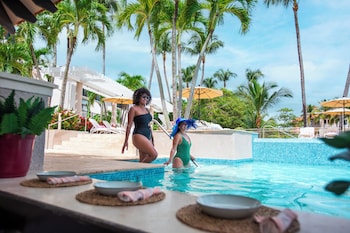 2 outdoor pools, open 9:00 AM to 9:00 PM, cabanas (surcharge) at Wyndham Palmas Beach and Golf Boutique Resort