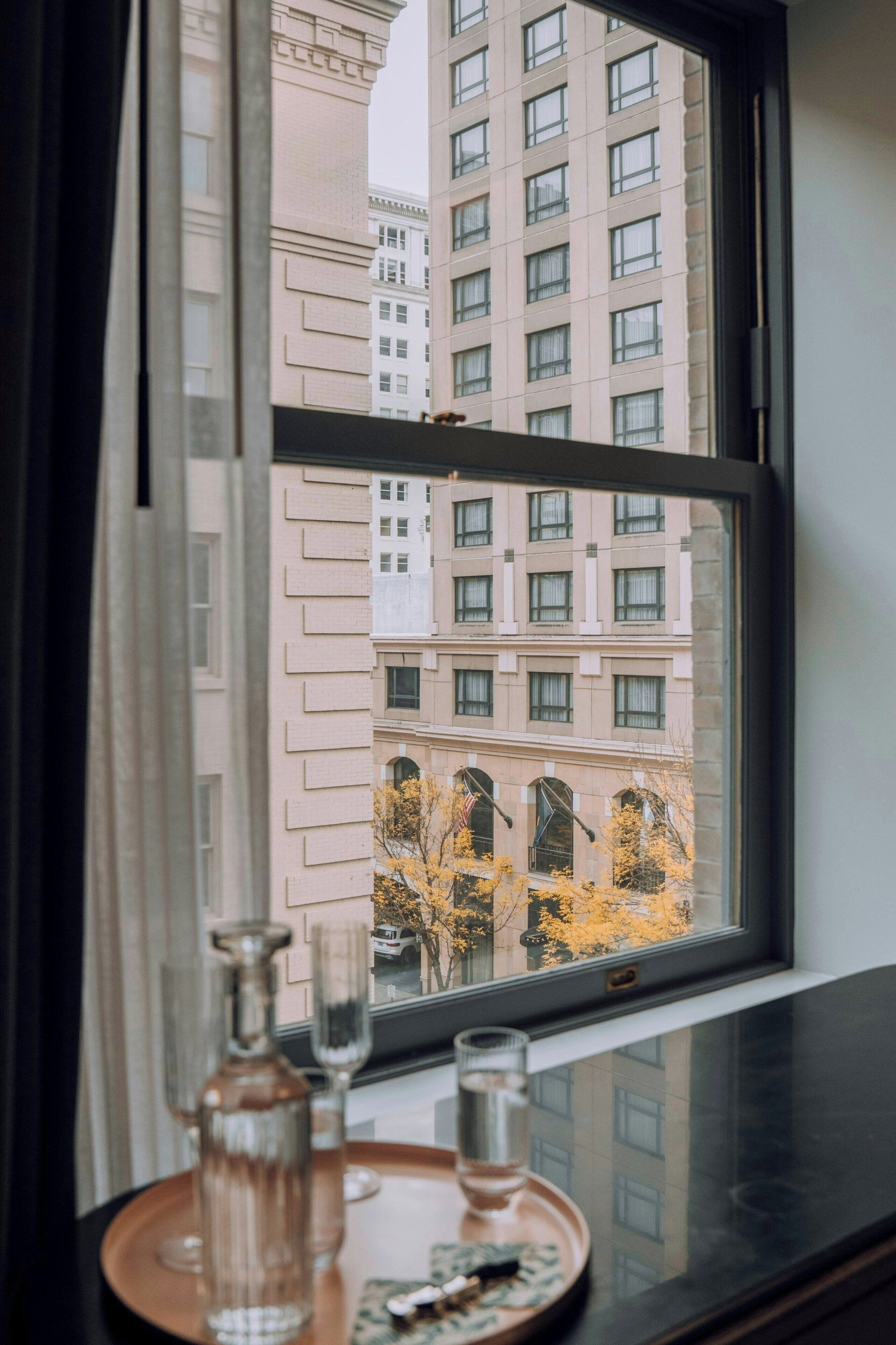 deluxe room, 1 king bed, city view, corner | egyptian cotton sheets, premium bedding, pillow-top beds, in-room safe