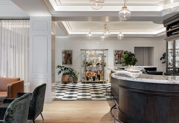 Check-in/check-out kiosk at Woodlark Hotel Portland, a Tribute Portfolio Hotel