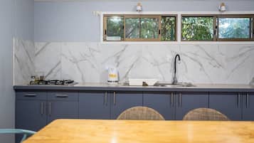 Cabin | Private kitchen | Full-sized fridge, stovetop, electric kettle, cookware/dishes/utensils