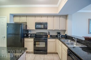 Condo, Multiple Beds, Private Pool, Beach View | Private kitchen | Fridge, microwave, oven, stovetop - Legacy Towers-Legacy II 1005 (Gulfport)