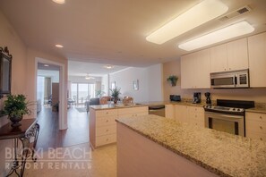 Condo, 2 Bedrooms, Balcony | Private kitchen | Fridge, microwave, oven, coffee/tea maker