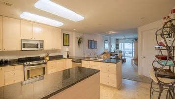 Condo, 2 Bedrooms, Balcony | Private kitchen | Fridge, microwave, oven, coffee/tea maker