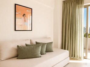 Superior Studio with Sea View and Balcony | Living area | Smart TV - Melitti Lucent (Rethymno)