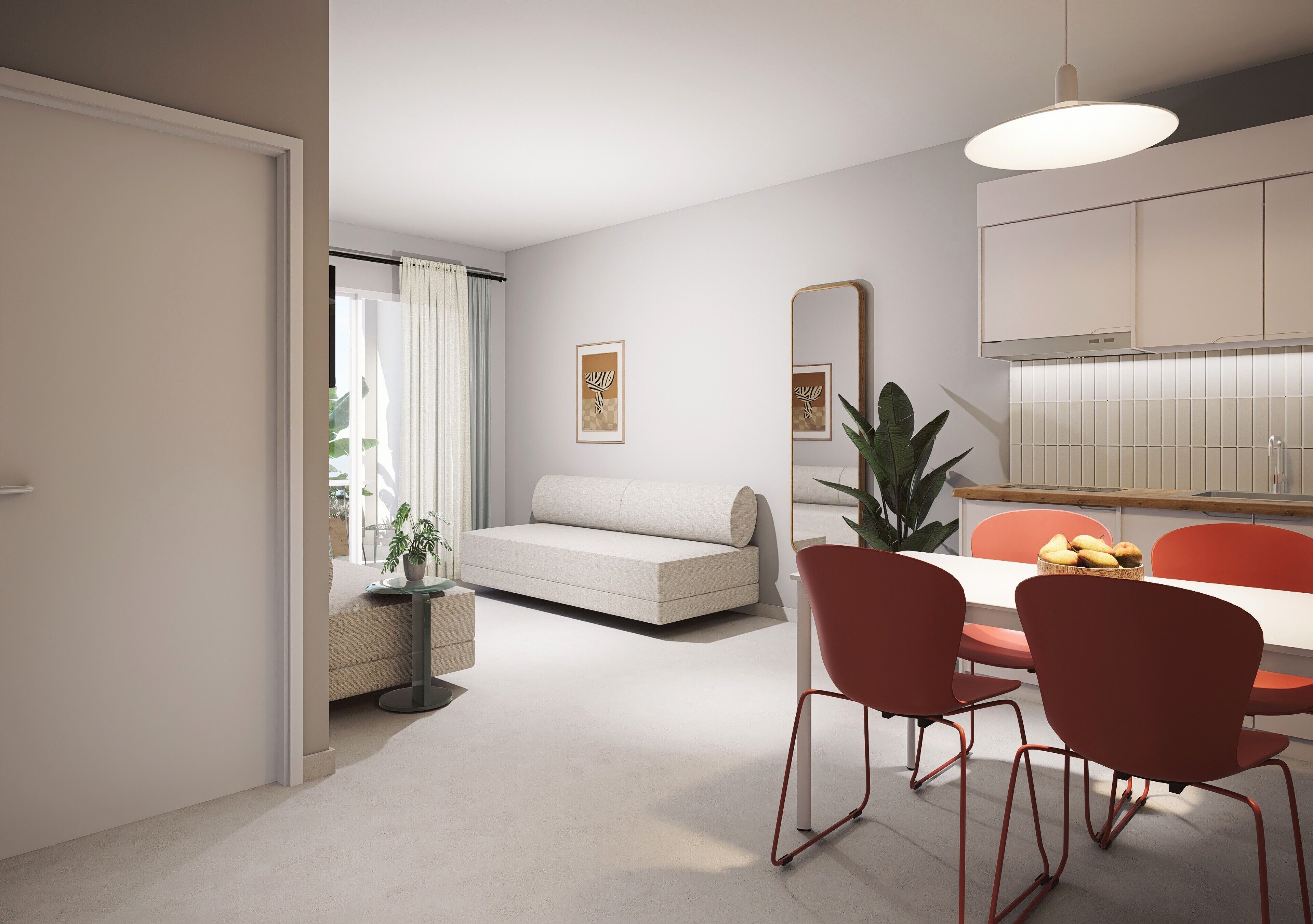 A modern living room with a sofa, dining table with chairs, and a kitchen area.