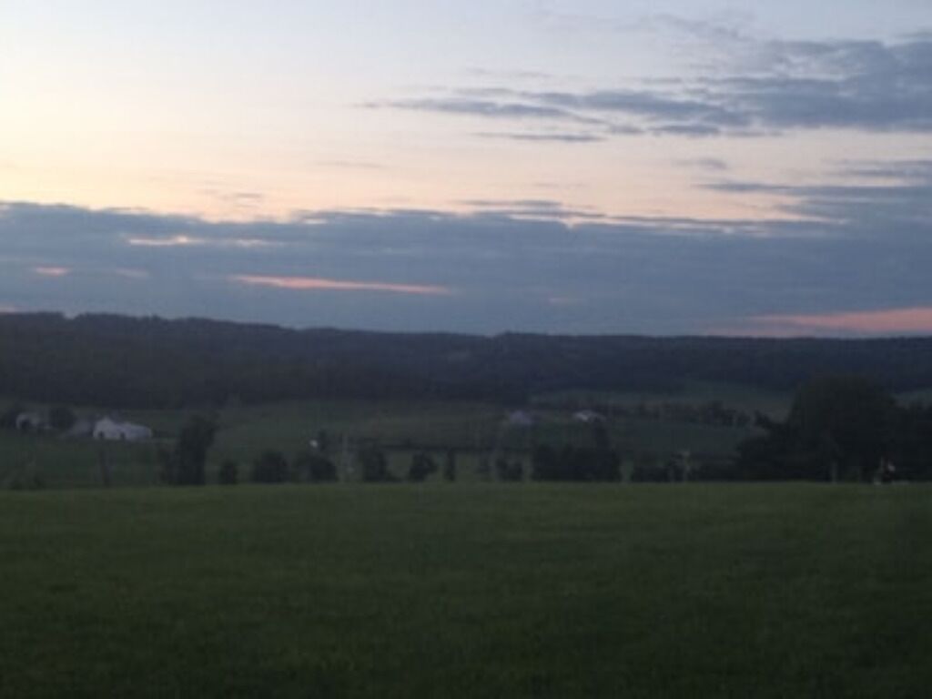 Escape to our romantic stone cottage by a pond overlooking Amish country