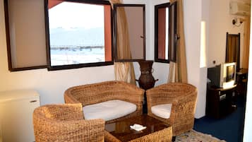 Suite Confort | Rideaux occultants, fer et planche Ă  repasser