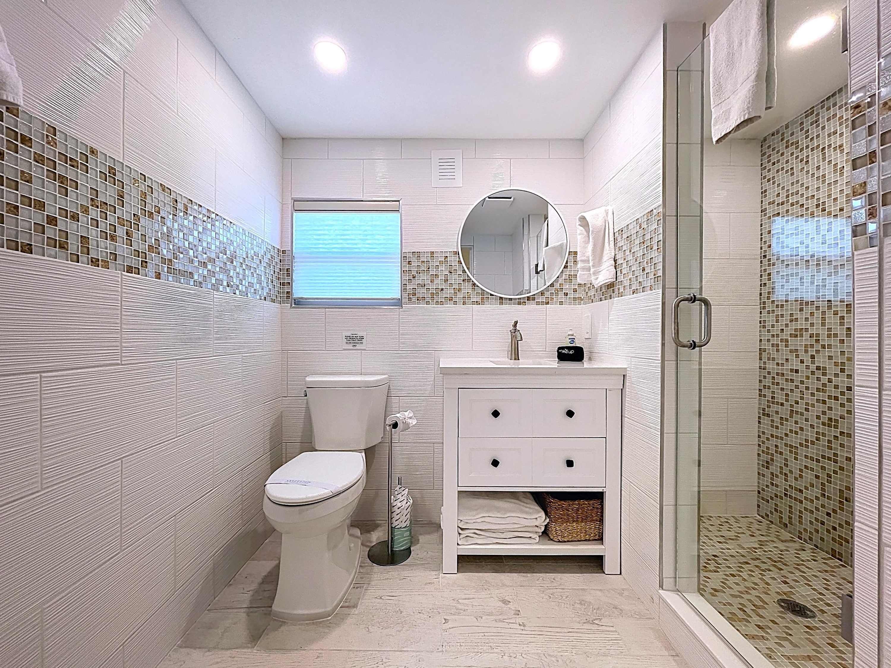 Shower, hair dryer, towels