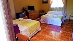 Family Room, Garden View | Minibar, in-room safe, free WiFi, bed sheets