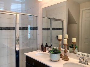 Combined shower/tub, hair dryer