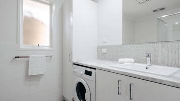 Shower, eco-friendly toiletries, hair dryer, towels