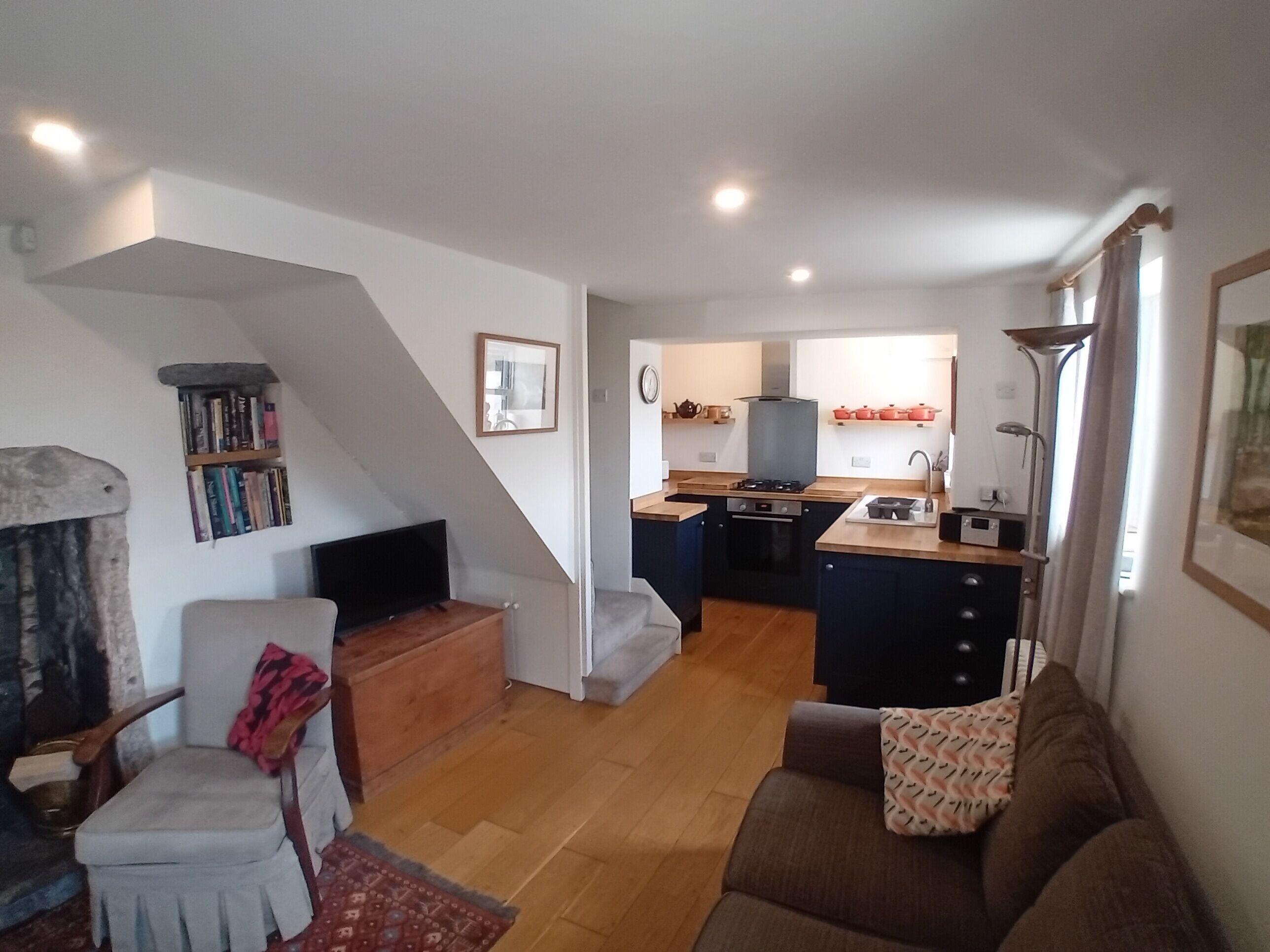 Smart TV, fireplace, books, music library