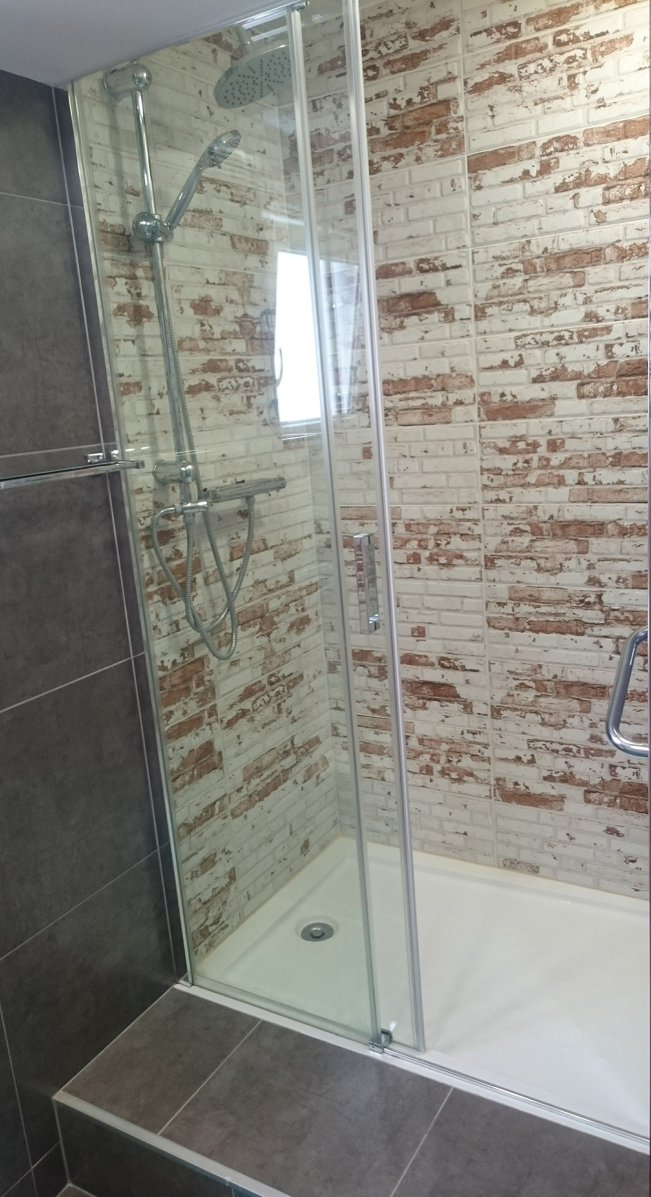 Combined shower/tub, hair dryer, towels, toilet paper