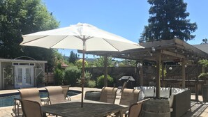 An outdoor patio with a pool, a covered seating area, and a barbecue grill. - Sonoma Retreat w/ Pool, Spa & Spacious Yard – Near Wineries & Sonoma Plaza (Sonoma)