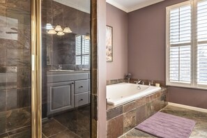 Combined shower/tub, hair dryer, towels, soap