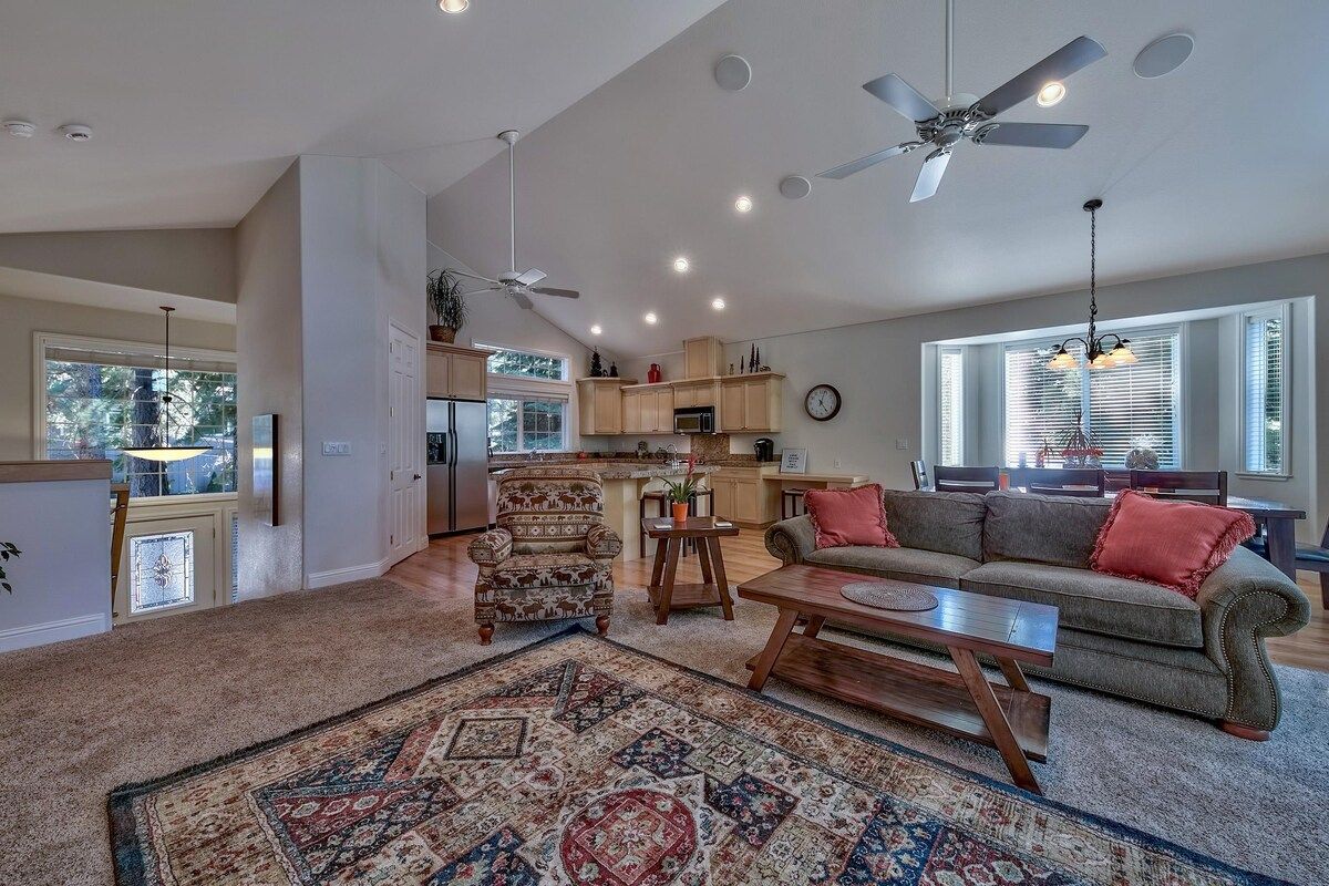 Upstairs great room, open kitchen, dining and living room.