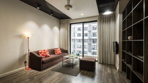 ซูพีเรียอพาร์ทเมนท์, 1 ห้องนอน, วิวสวน | บริเวณนั่งเล่น