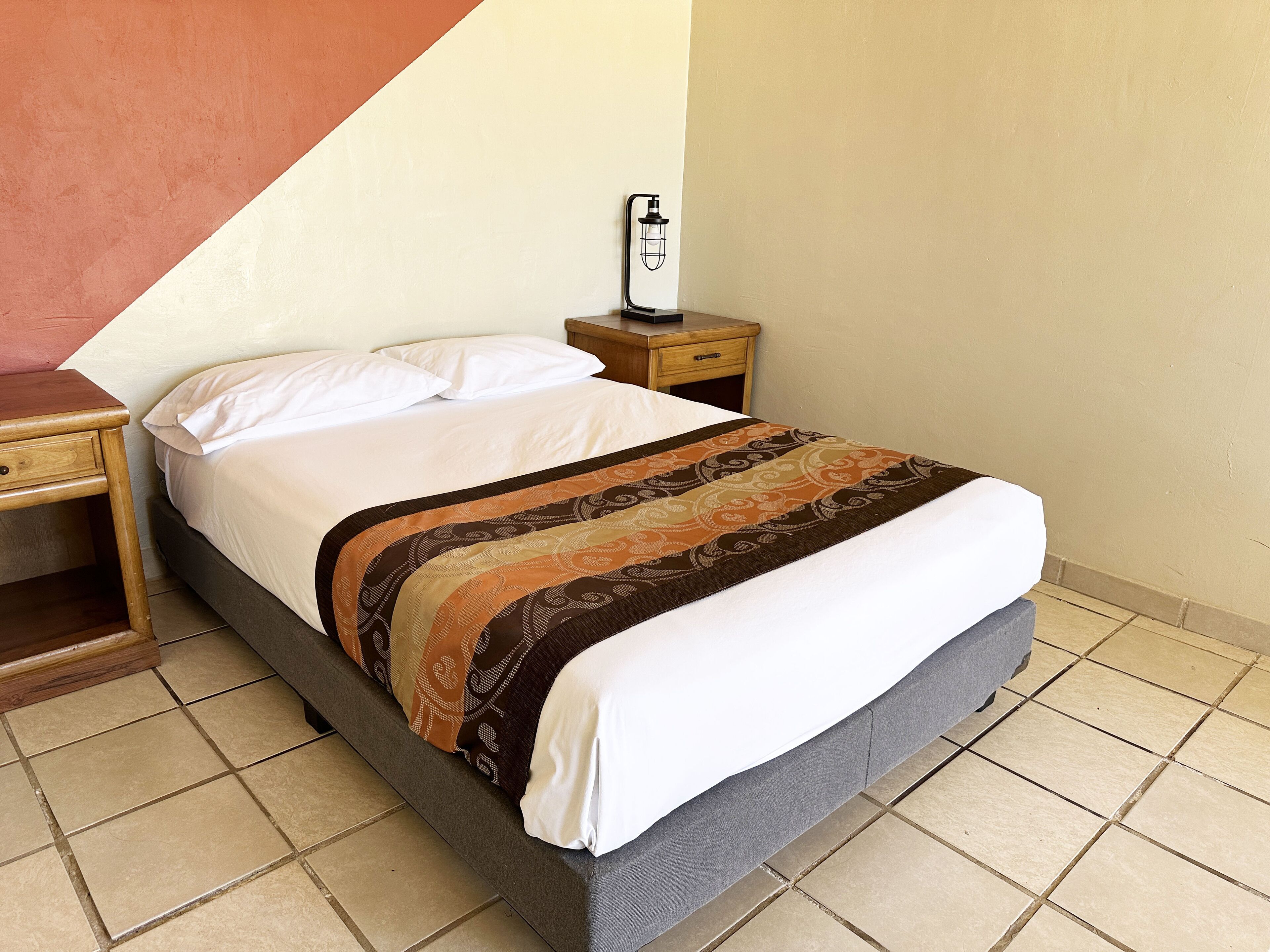 standard suite, 2 double beds, non smoking, sea view | 1 bedroom, desk, iron/ironing board, bed sheets