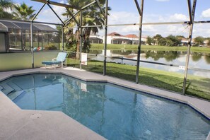 Seasonal outdoor pool, pool umbrellas, pool loungers