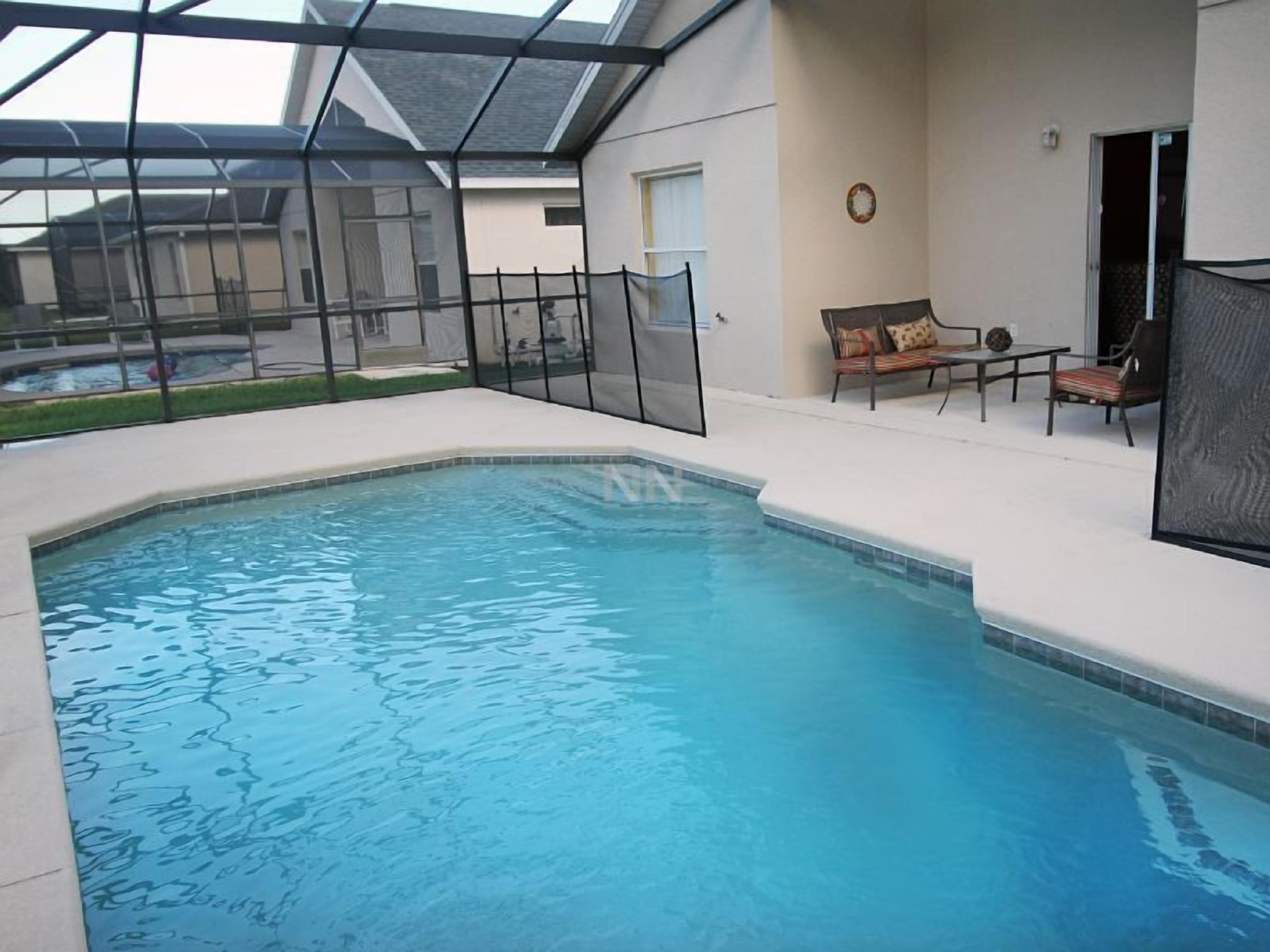 Seasonal outdoor pool, pool loungers
