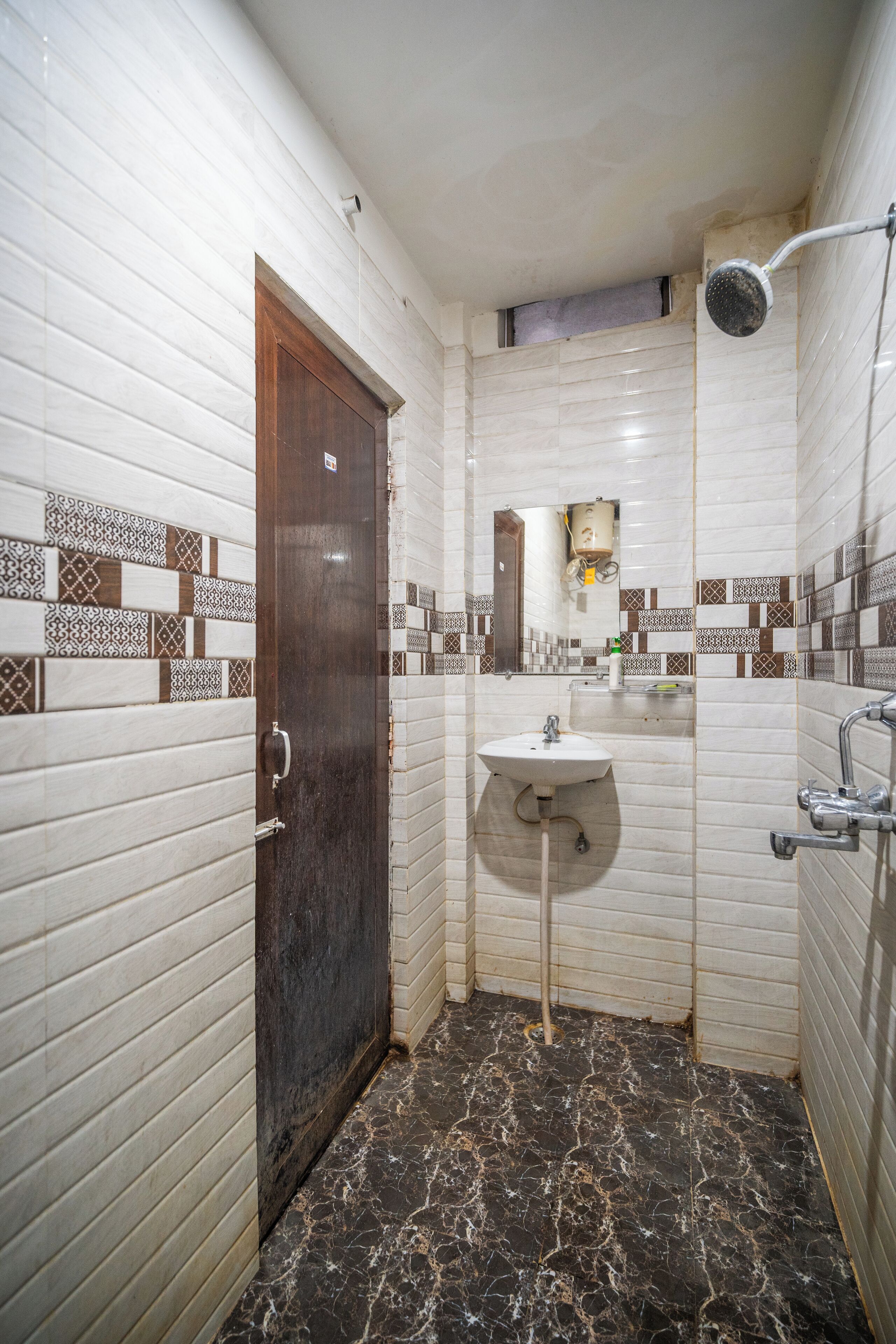 Habitación individual estándar | Baño | Ducha y cabezal de ducha tipo lluvia