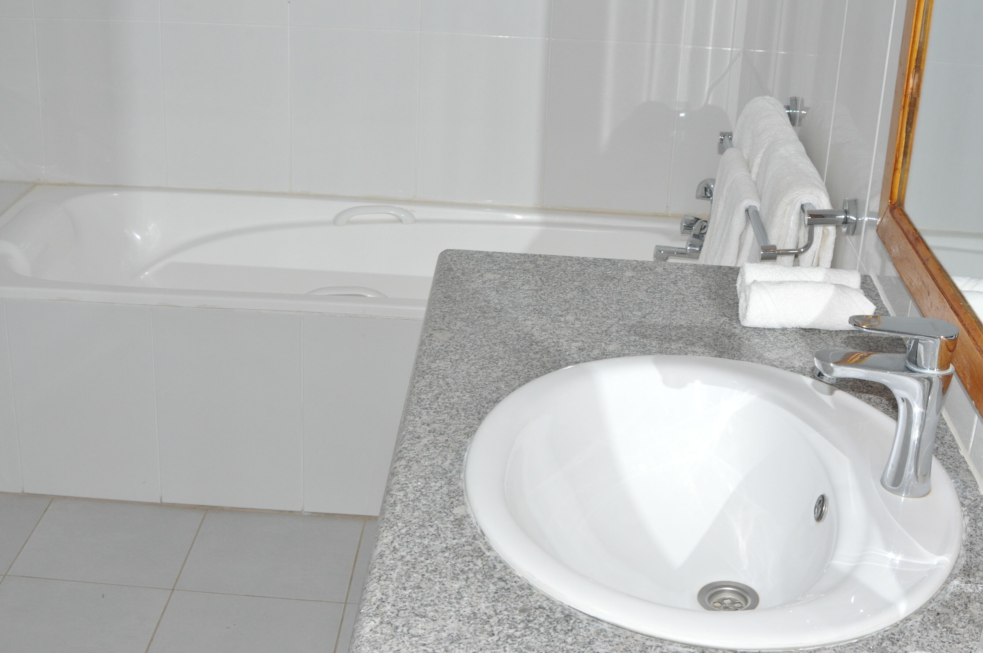 separate bathtub and shower, deep-soaking bathtub, free toiletries