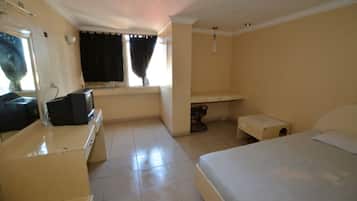Standard Single Room | Living room | 32-inch TV with cable channels