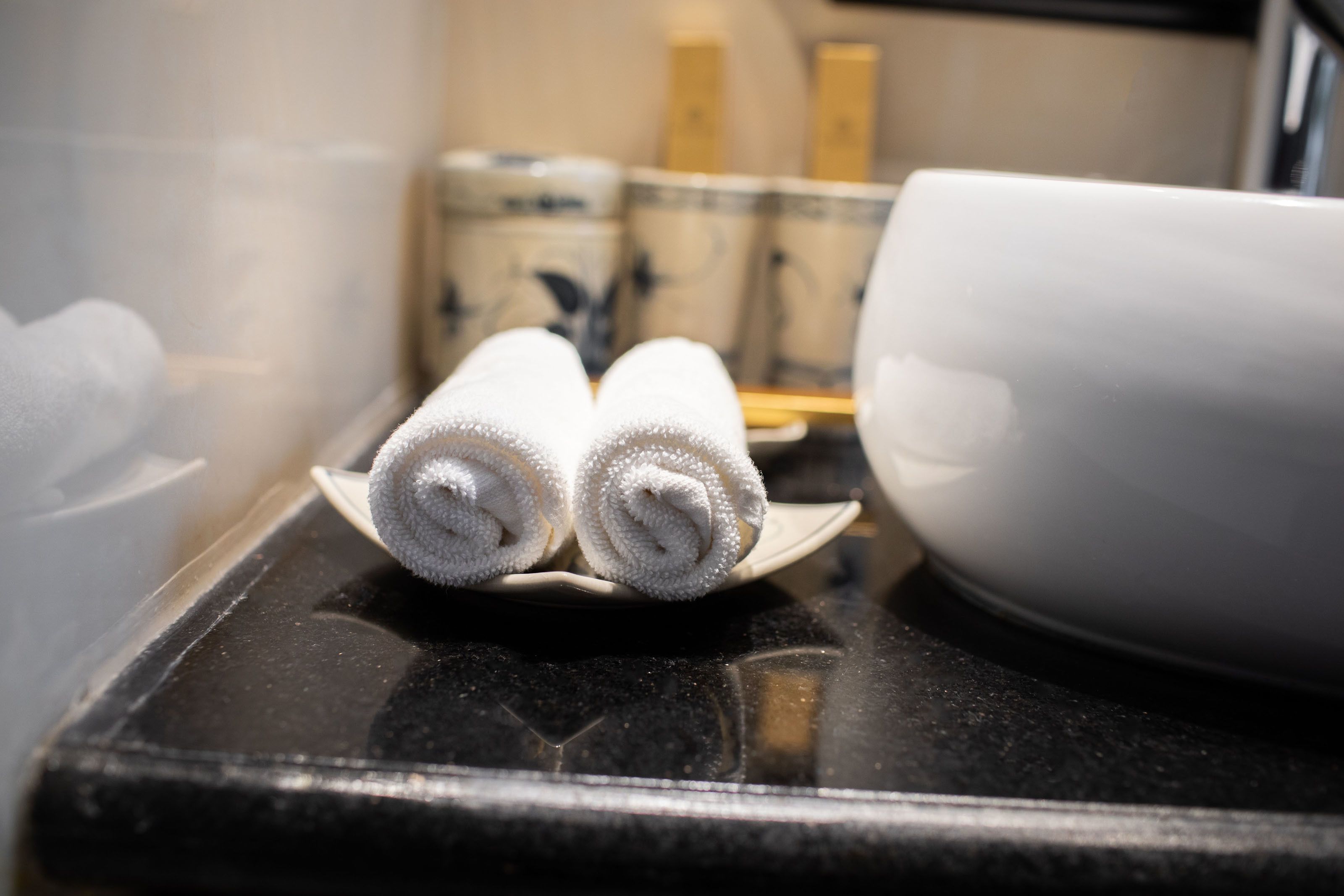 deluxe double or twin room, city view | bathroom | deep-soaking bathtub, free toiletries, hair dryer, dressing gowns