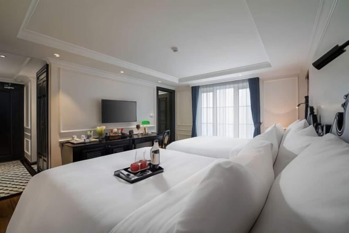 Premium bedding, memory foam beds, minibar, in-room safe