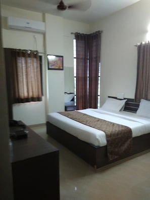 Deluxe AC Room | Blackout drapes, free WiFi, bed sheets