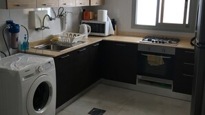 Leilighet, 4 soverom | Eget kjøkken | Kjøleskap, mikrobølgeovn, ovn og kokeplater