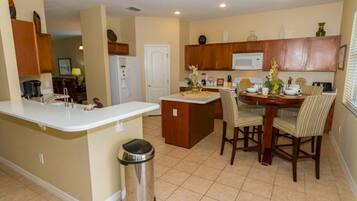 Family Villa, Garden Area | Shared kitchen | Fridge, microwave, oven