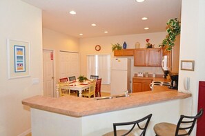 Family Villa, Garden Area | Shared kitchen | Fridge, microwave, oven