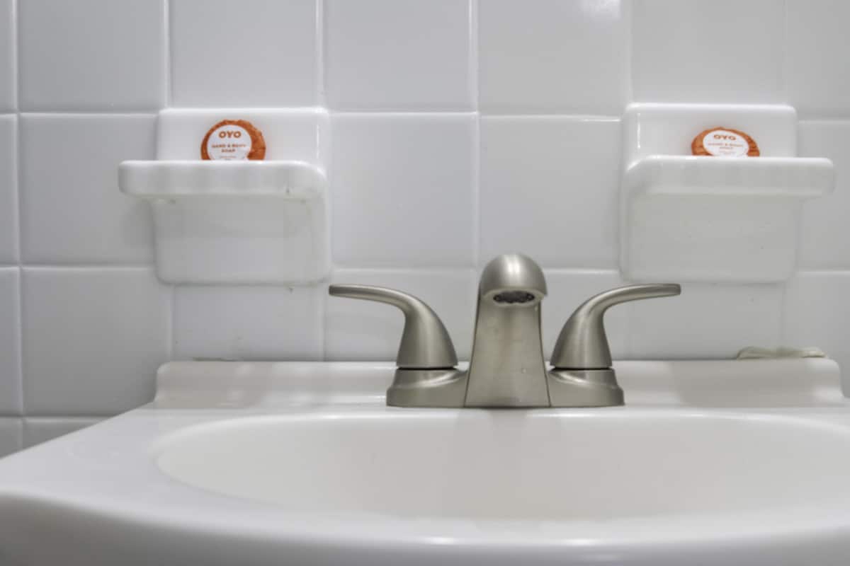 One Bedroom Deluxe suite & futon with kitchen | Bathroom | Free toiletries, hair dryer, towels