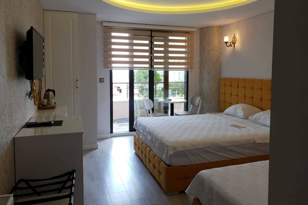 Habitación ejecutiva | Ropa de cama de alta calidad, minibar, escritorio y wifi gratis