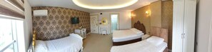 Habitación Deluxe | Ropa de cama de alta calidad, minibar, escritorio y wifi gratis