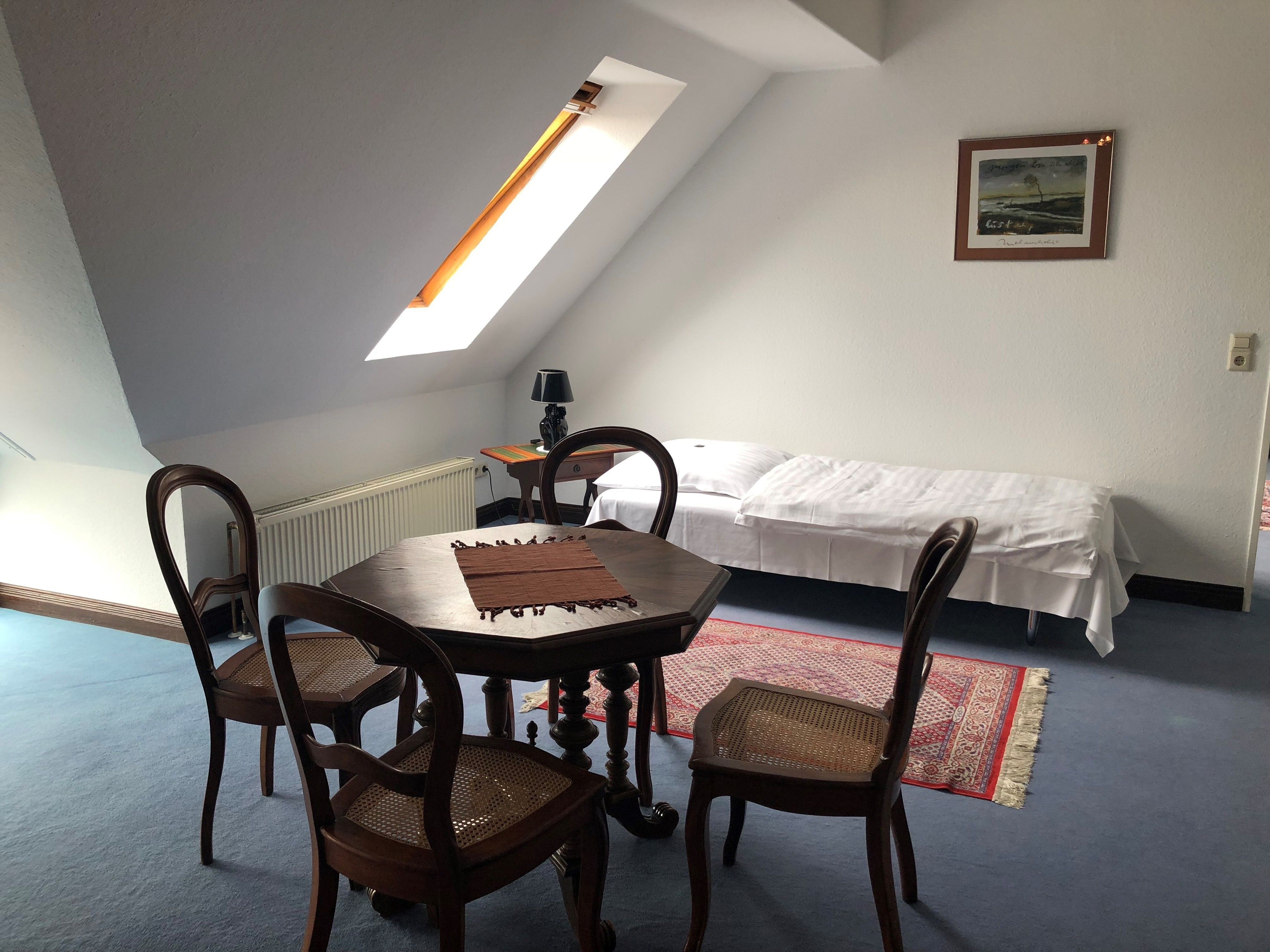 comfort apartment | living area | flat-screen tv