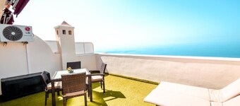 APARTMENT A few meters from a black sand beach.