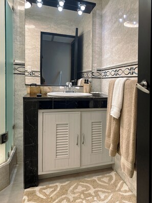 Shower, hair dryer, towels, soap - CANCUN BEACHFRONT CONDOS - GREAT VIEWS (Cancun)