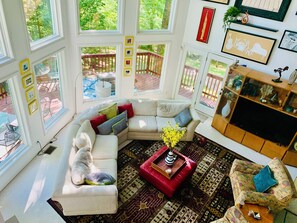 Smart TV, fireplace, books, printers