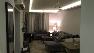 Departamento, 1 habitación | Sala de estar | Televisión LCD