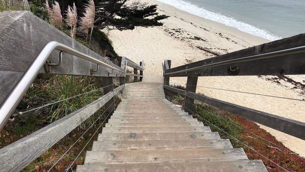 A wooden staircase leading to a beach with a railing on both sides. - New Home w Expansive Ocean and Sunset Views, Steps to the Seal Cove Beach (Moss Beach)