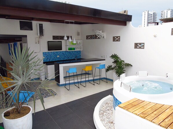 Terrace, bar and Jacuzzi area