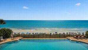 A pool with a view of the beach and ocean. - Stunning & Spacious 4BR Beachfront Condo at Adagio B202 with Gulf Front Views! (Santa Rosa Beach)
