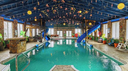 Wood Haven Cabin with a hot tub, fire pit, & indoor pool!