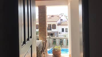 Superior Double or Twin Room, 1 Double or 2 Single Beds, Pool View | Living area | 35-cm LED TV with satellite channels, TV