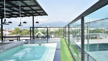 Outdoor pool, open 8 AM to 11:00 PM, sun loungers