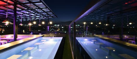 Outdoor pool, open 8 AM to 11:00 PM, pool loungers