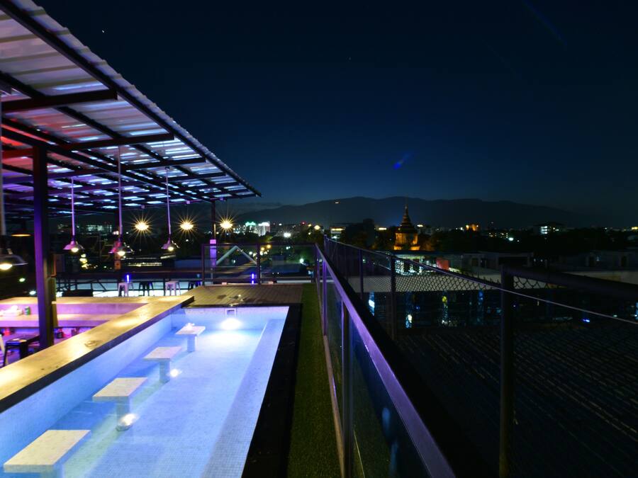 Outdoor pool, open 8 AM to 11:00 PM, pool loungers