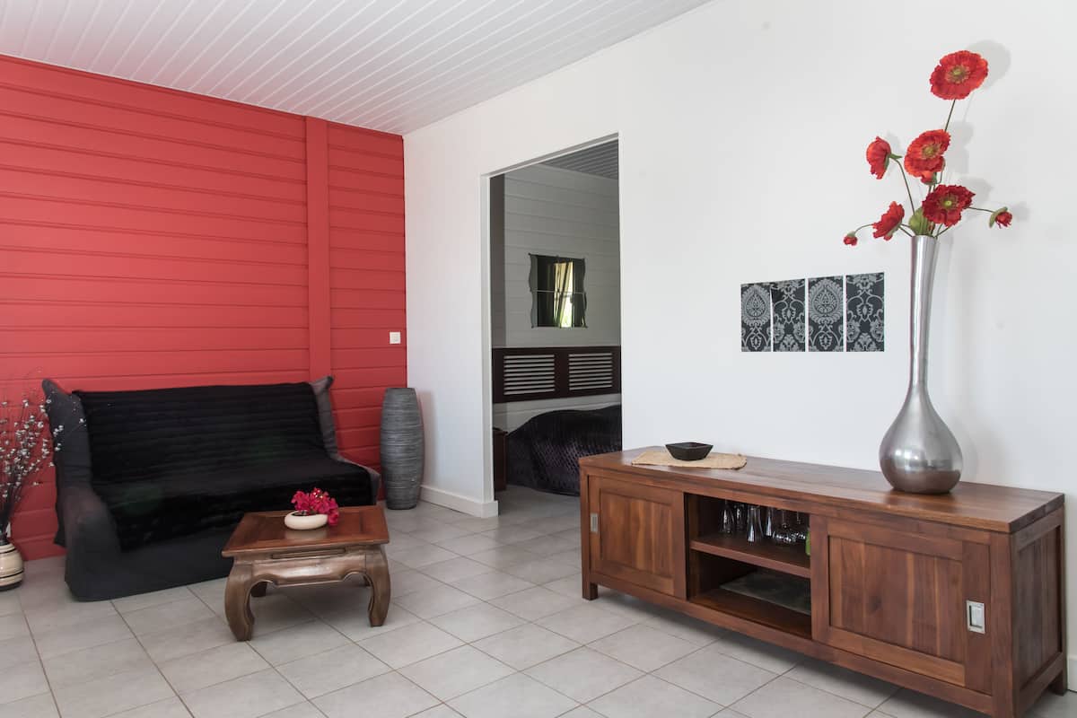 superior chalet, 1 double bed, non smoking | living area | flat-screen tv